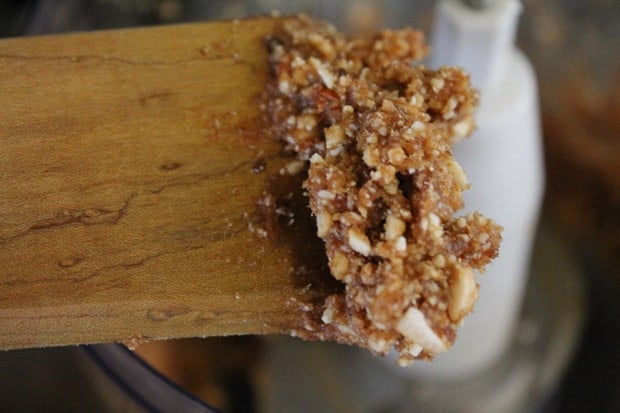 A spatula with blended dates and cashews