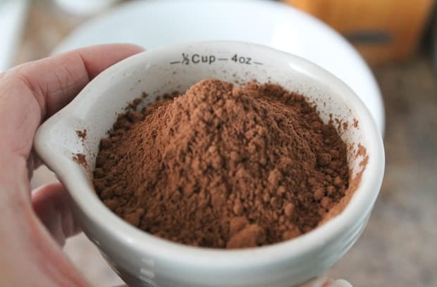 cocoa powder in a measuring cup