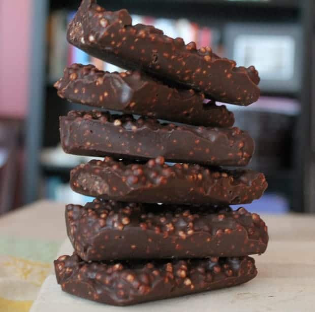 healthy crunch bars stacked on a wooden board