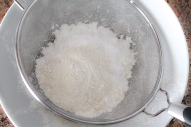 gluten free flours and starches being sifted together