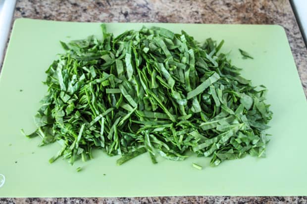 Chopped spinach on a cutting board