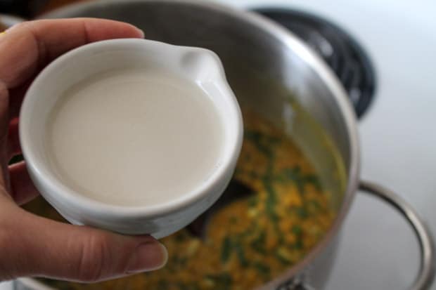 Coconut milk in a measuring cup