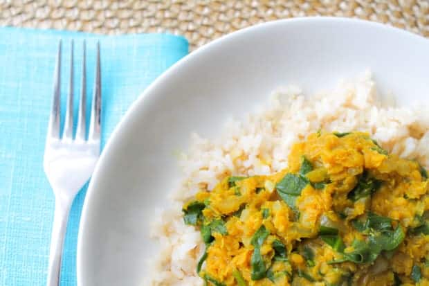 This Red Lentil & Spinach Dahl recipe is a delicious vegetarian option for a meatless Monday dinner. Pair it up with brown rice or a pan of roasted vegetables. #vegetarian #meals #recipe