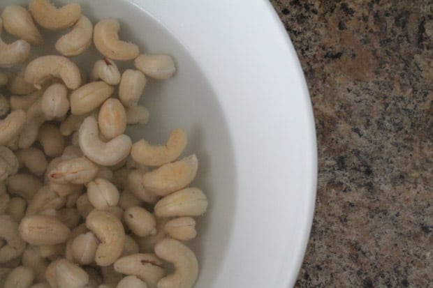 cashews in a bowl soaking in water