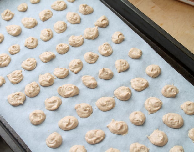 yogurt dots on a parchment lined baking sheet