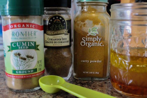 Jars of spices on a kitchen counter