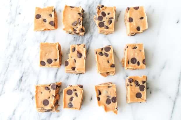 Chocolate Chip Freezer fudge cut into squares on a white marble board