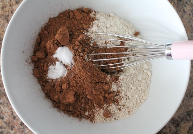 flour and cocoa powder being whisked