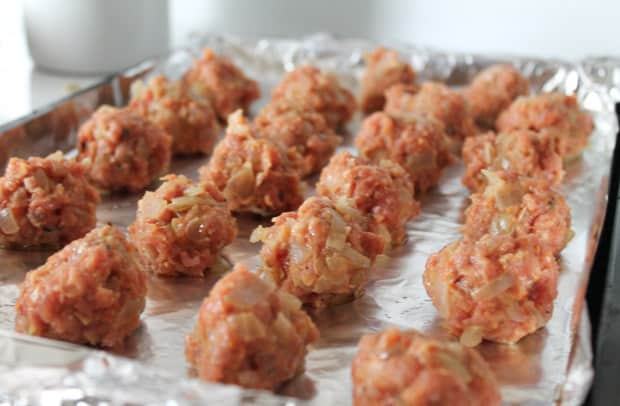 Turkey Meatballs on a baking tray ready to be baked the oven.