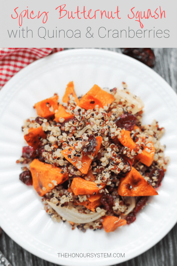 This Spicy Roasted Butternut Squash with Quinoa & Cranberries recipe can be enjoyed as a warm, vegan fall salad or a tasty, gluten free side dish. #glutenfree #sidedish #vegan