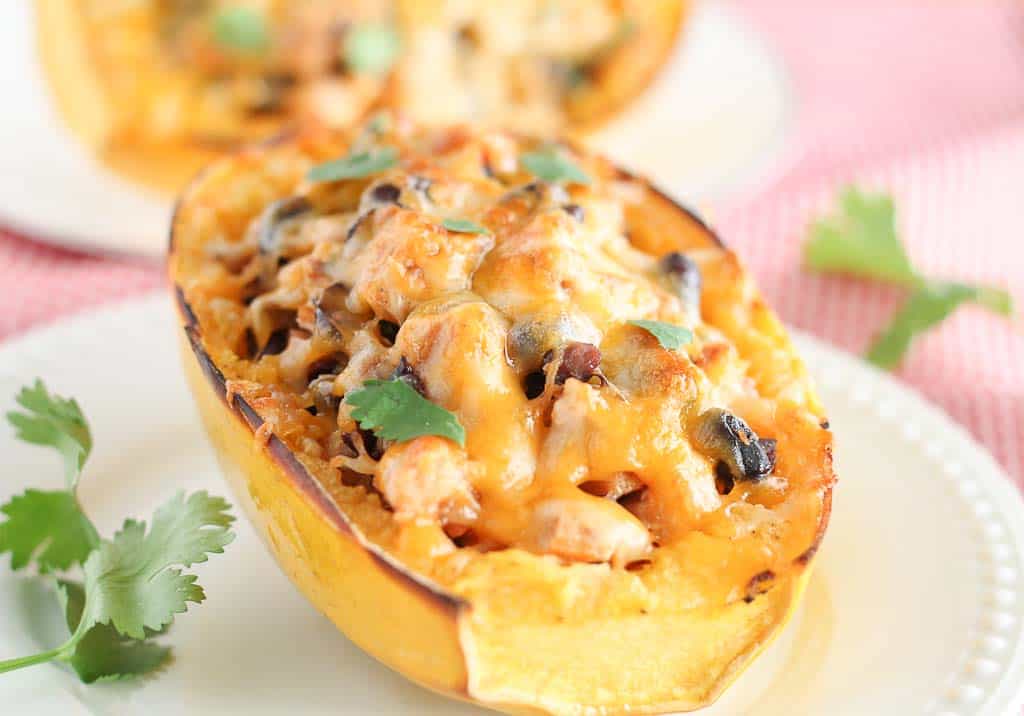 stuffed spaghetti squash garnished with fresh cilantro