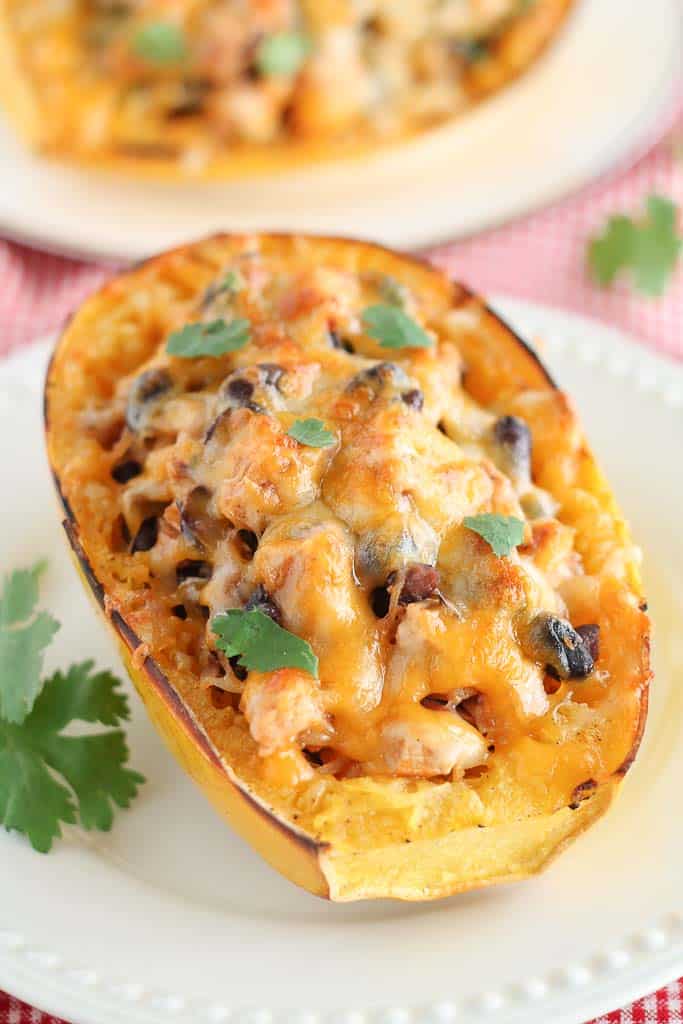 stuffed spaghetti squash garnished with fresh cilantro