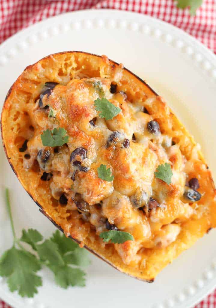 stuffed spaghetti squash garnished with fresh cilantro