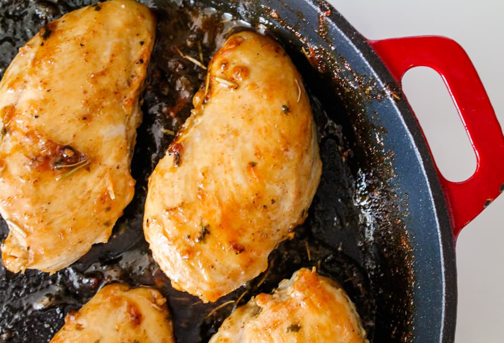 maple glazed chicken in a pan.