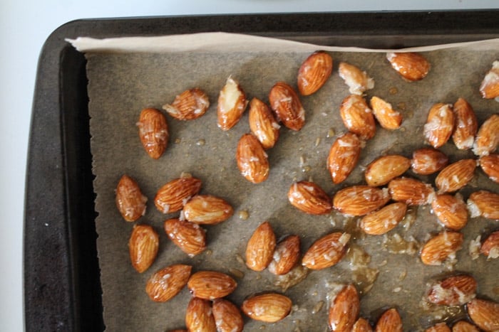 Almonds on a baking sheet ready for the oven