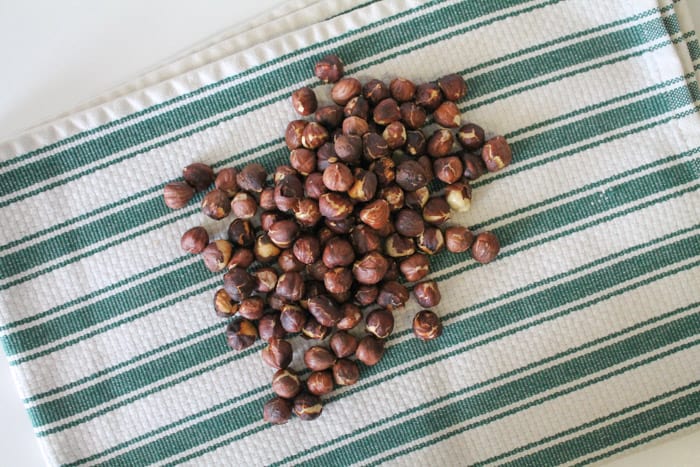 roasted hazelnuts on a clean tea towel.