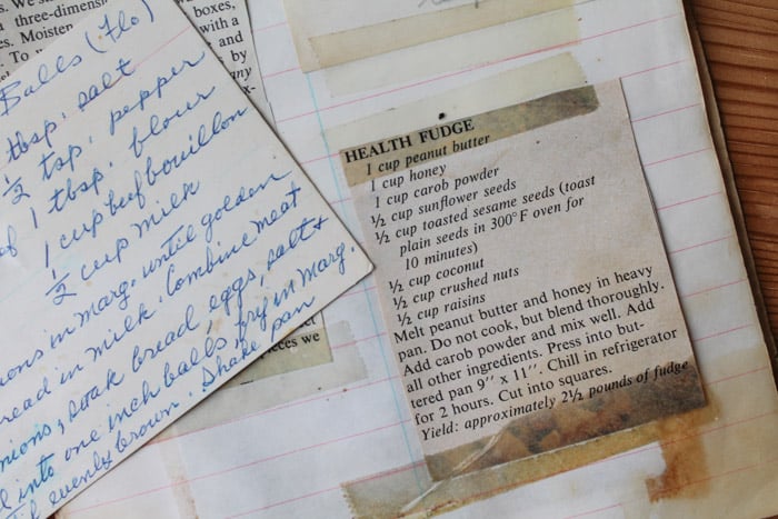 a page of a recipe book with a printed recipe taped in it