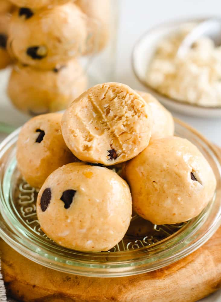 a plate of chocolate chip cookie dough protein balls