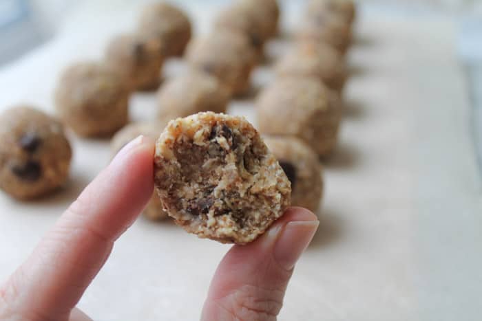 hand holding a healthy treat with a bite out of it