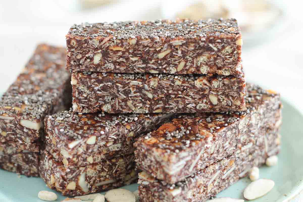healthy chewy granola bars stacked up on a plate