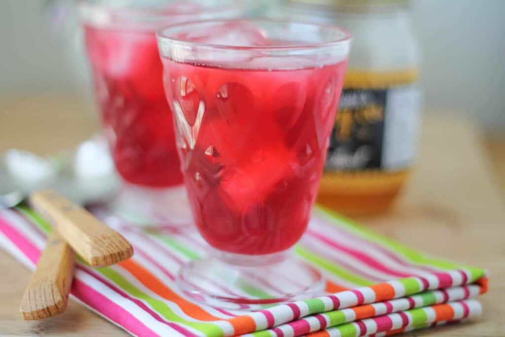 Ice Tea Coolers in a frosty glass on a striped napkin