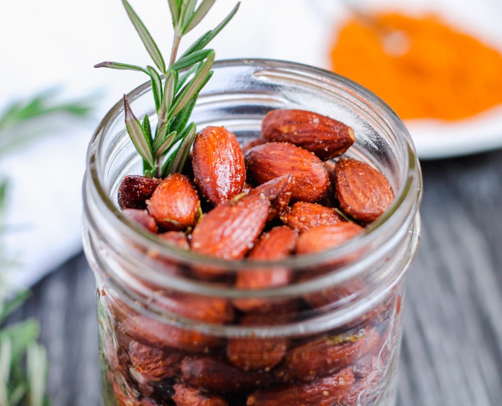 rosemary almonds in a jar.