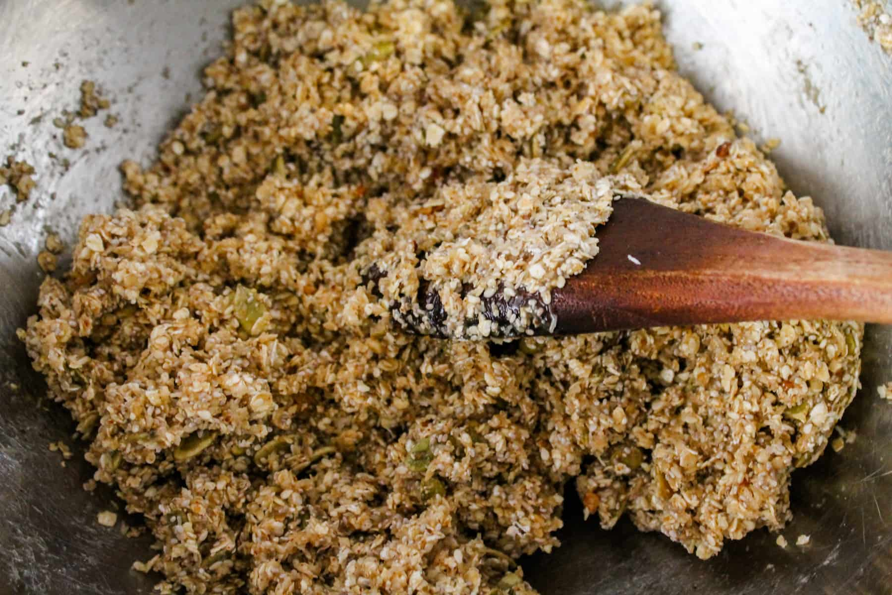 a bowl of the mixture being stirred with a spoon.