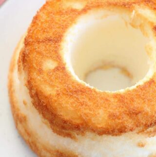 freshly baked gluten free angel food cake on a plate