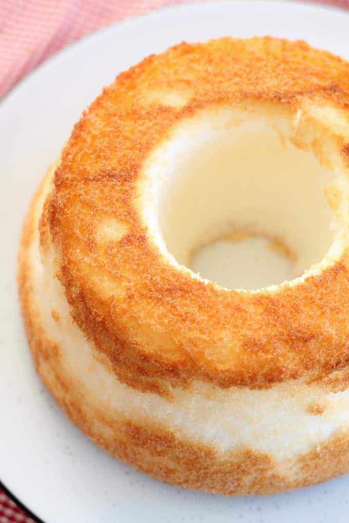 freshly baked gluten free angel food cake on a plate