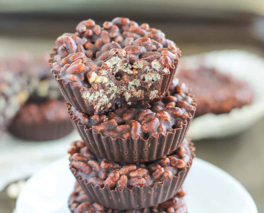 crispy chocolate peanut butter crunch cups stacked up