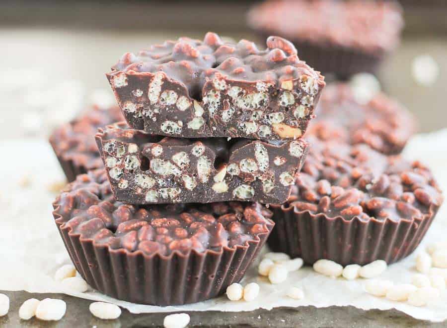 crispy chocolate peanut butter crunch cups stacked up