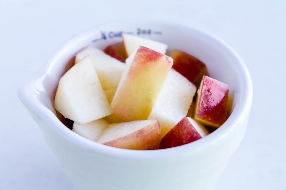 cubed apples in a dish.