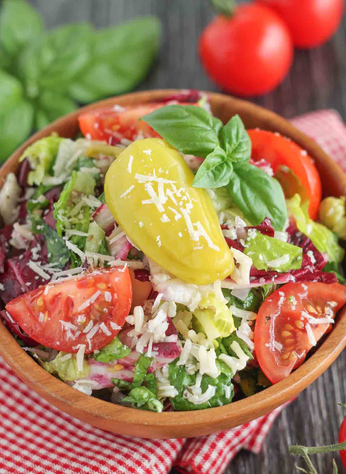 Italian Cold Rice Salad in a wooden bowl