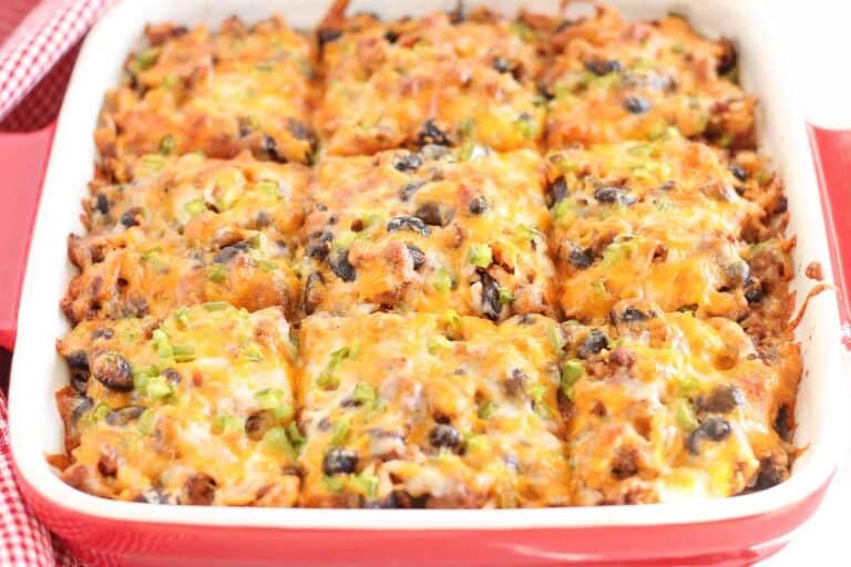 A casserole dish with tex mex beef casserole.