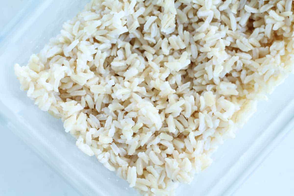 cooked rice in a glass container