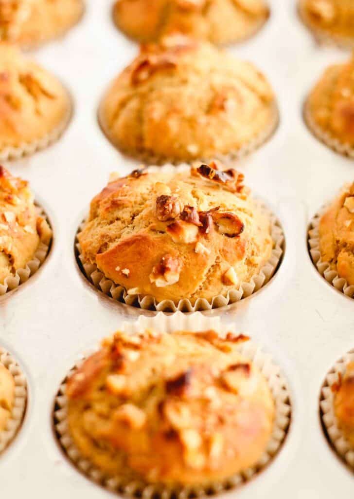 freshly baked banana muffins in a muffin tin