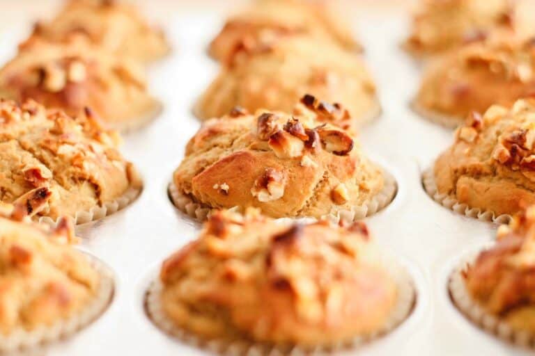 freshly baked banana muffins in a muffin tin