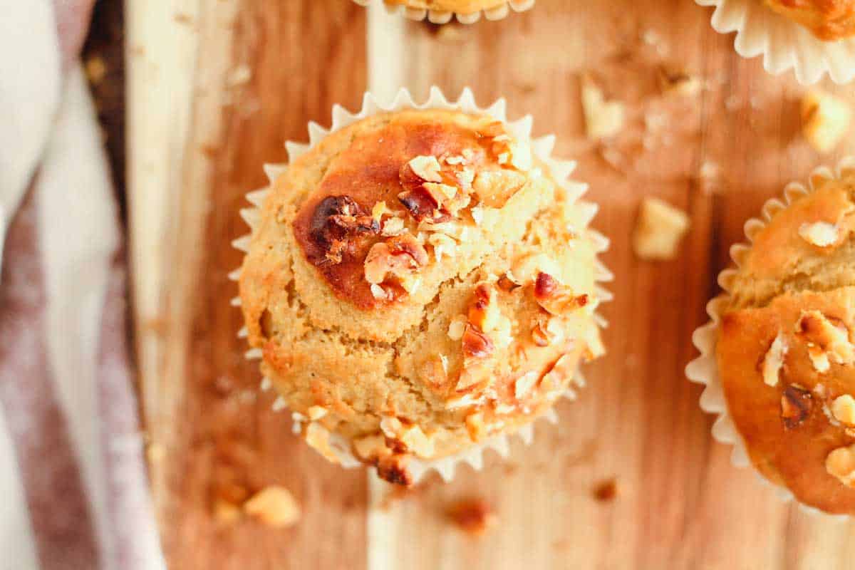 greek yogurt banana muffins on a wooden board