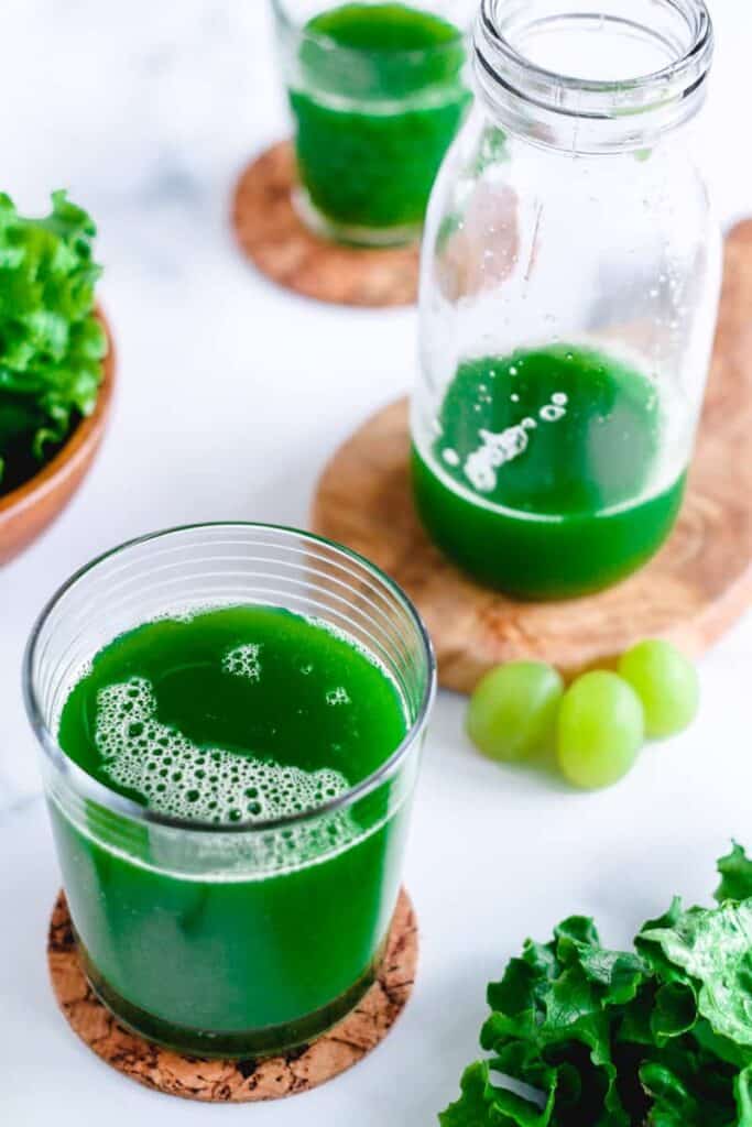 a glass of fresh green juice