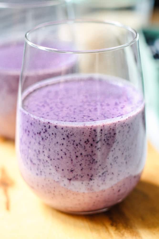 healthy breakfast blueberry smoothie in a glass.