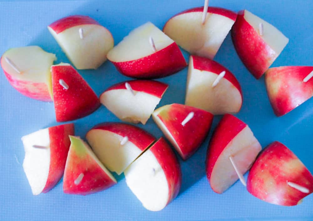 cut apples with toothpicks.