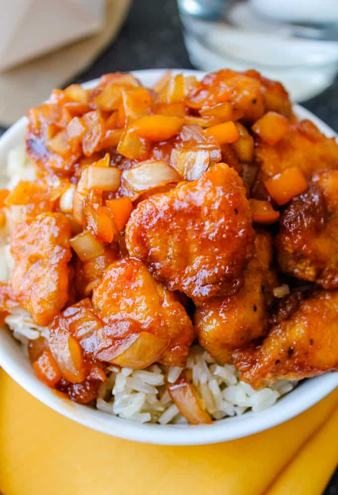 a bowl of sweet and sour chicken.