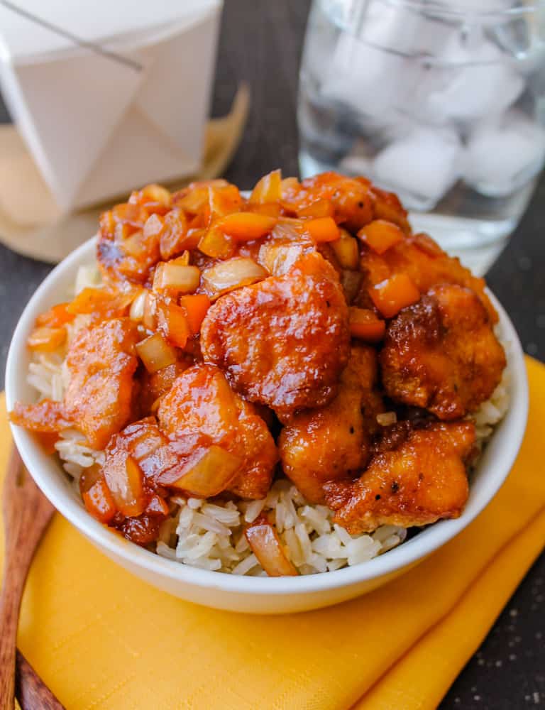 a bowl of sweet and sour chicken.