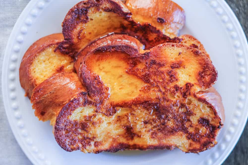 thick sliced of french toast on a plate.