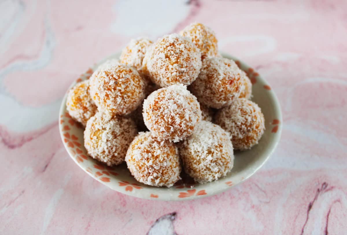 apricot balls on a plate.