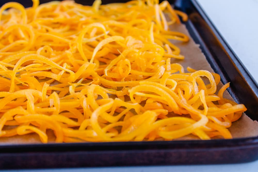 a baking sheet of vegetable spaghetti.