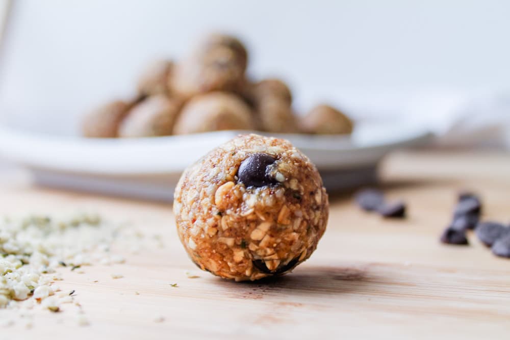 hemp seed energy balls on a board.