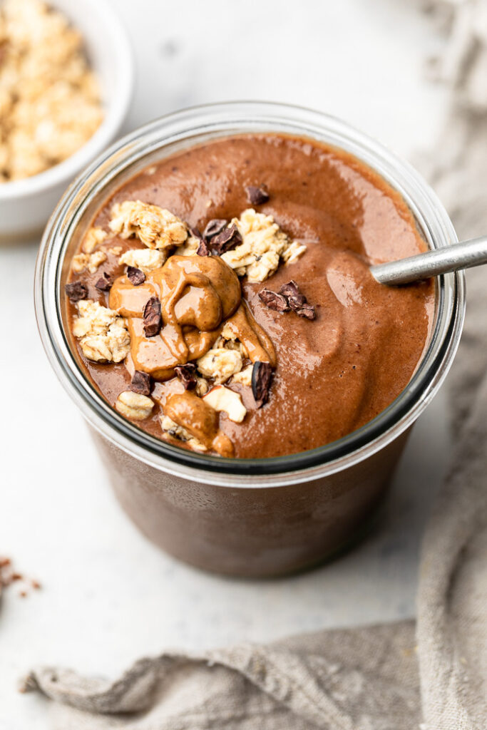 chocolate protein smoothie in a glass.