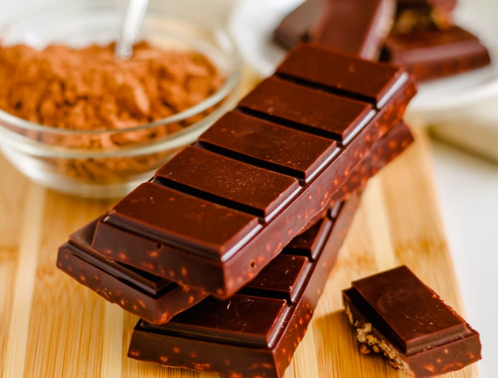 a stack of dark chocolate bars.
