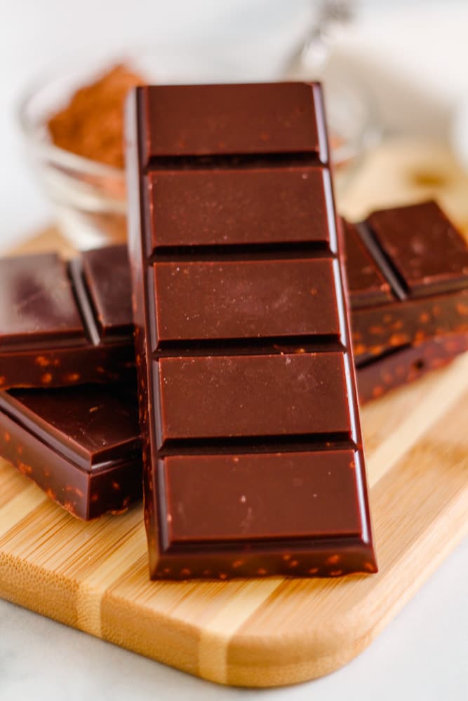 a stack of dark chocolate bars.